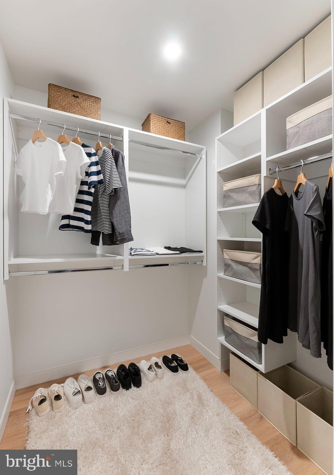 210 South 12th Street, Unit 0B128P Philadelphia, PA 19107 - Photo 13 of 45 a view of walk in closet with clothes and shoes