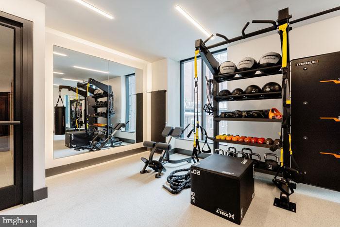 210 South 12th Street, Unit 0B128P Philadelphia, PA 19107 - Photo 26 of 45 a view of a room with gym equipment