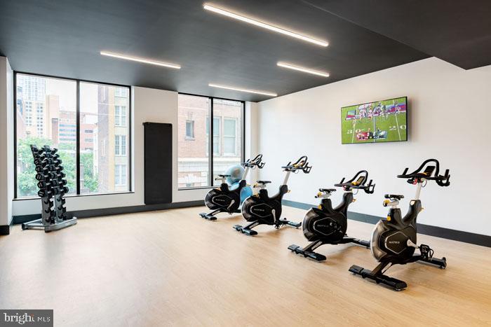210 South 12th Street, Unit 0B128P Philadelphia, PA 19107 - Photo 27 of 45 a view of a room with gym equipment