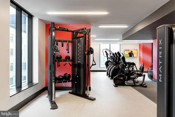 210 South 12th Street, Unit 0B128P Philadelphia, PA 19107 - Photo 32 of 45 a view of a room with gym equipment
