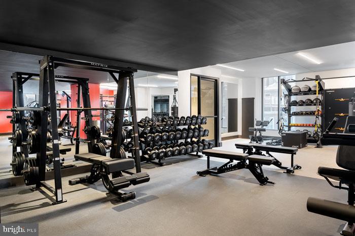 210 South 12th Street, Unit 0B128P Philadelphia, PA 19107 - Photo 33 of 45 a view of a room with gym equipment