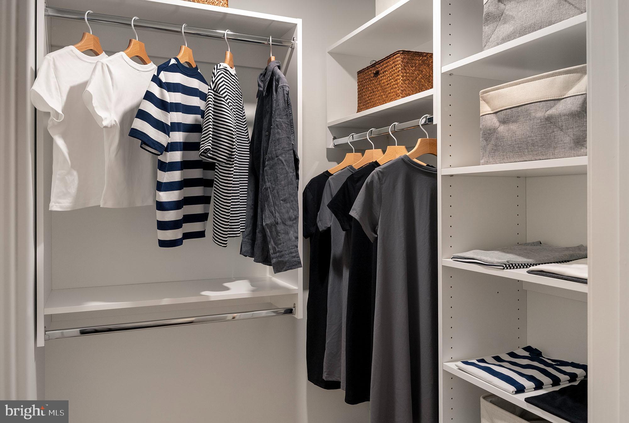 210 South 12th Street, Unit 0B128P Philadelphia, PA 19107 - Photo 7 of 45 a view of walk in closet with clothes and shoes