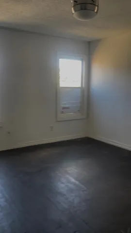a view of a room that has a window