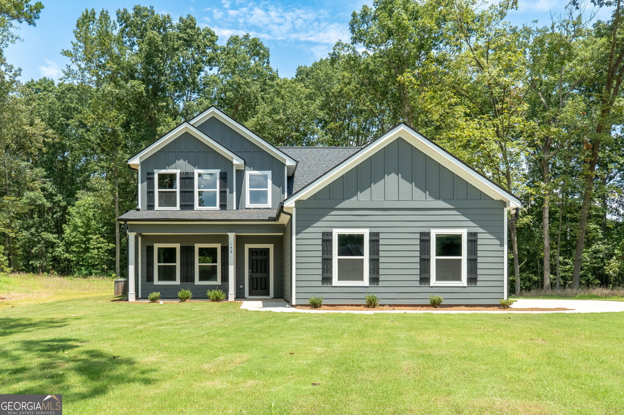 205 Yancey Road Covington, GA 30014 - Photo 16 of 49 NOTE THAT 205 YANCEY ROAD IS LEFT SIDE GARAGE ENTRY.