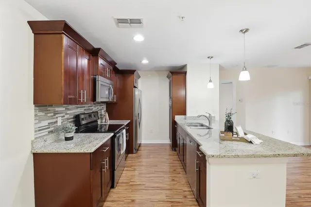 a view of a house with a street