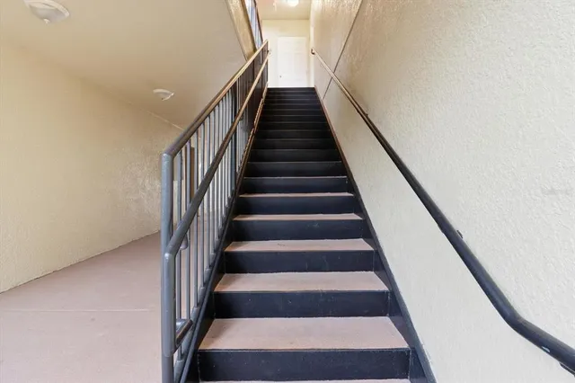 a kitchen with a sink and a window