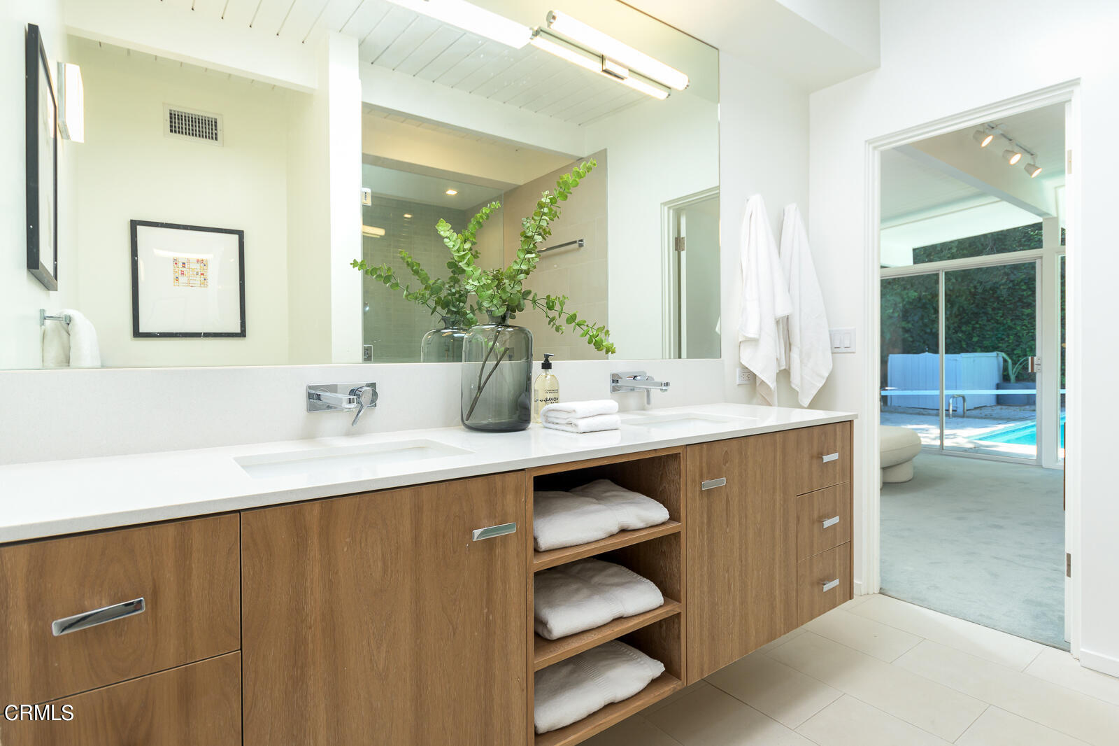 3525 El Lado Drive Glendale, CA 91208 - Photo 24 of 46 a bathroom with a sink and a mirror
