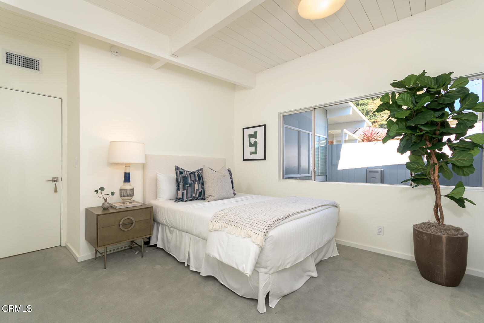 3525 El Lado Drive Glendale, CA 91208 - Photo 31 of 46 a bedroom with a bed and a potted plant