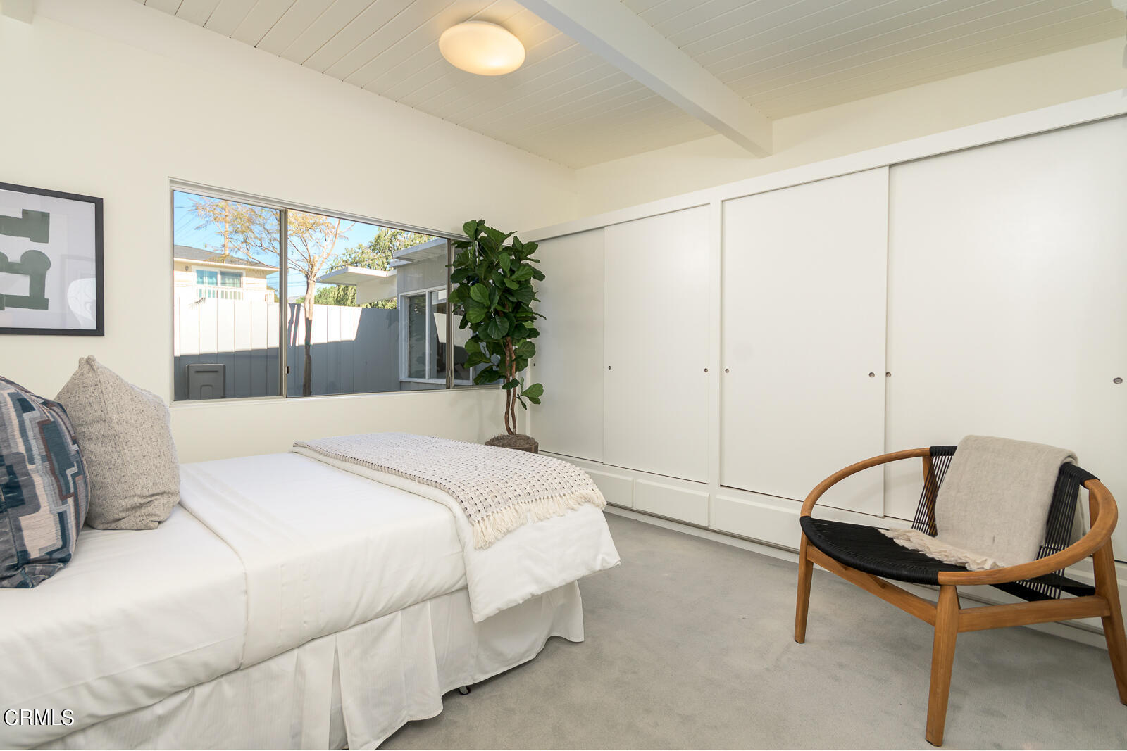 3525 El Lado Drive Glendale, CA 91208 - Photo 32 of 46 a bedroom with a bed and a table in it