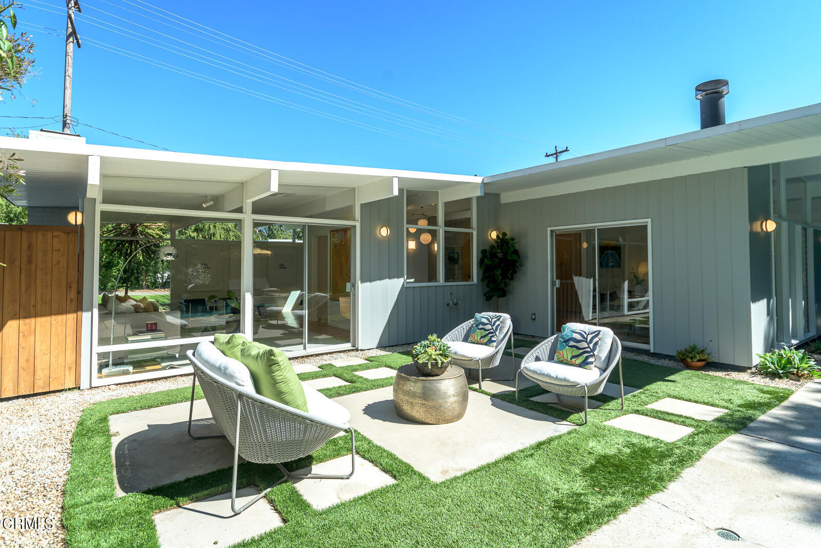 3525 El Lado Drive Glendale, CA 91208 - Photo 38 of 46 a view of a patio with a dining table and chairs