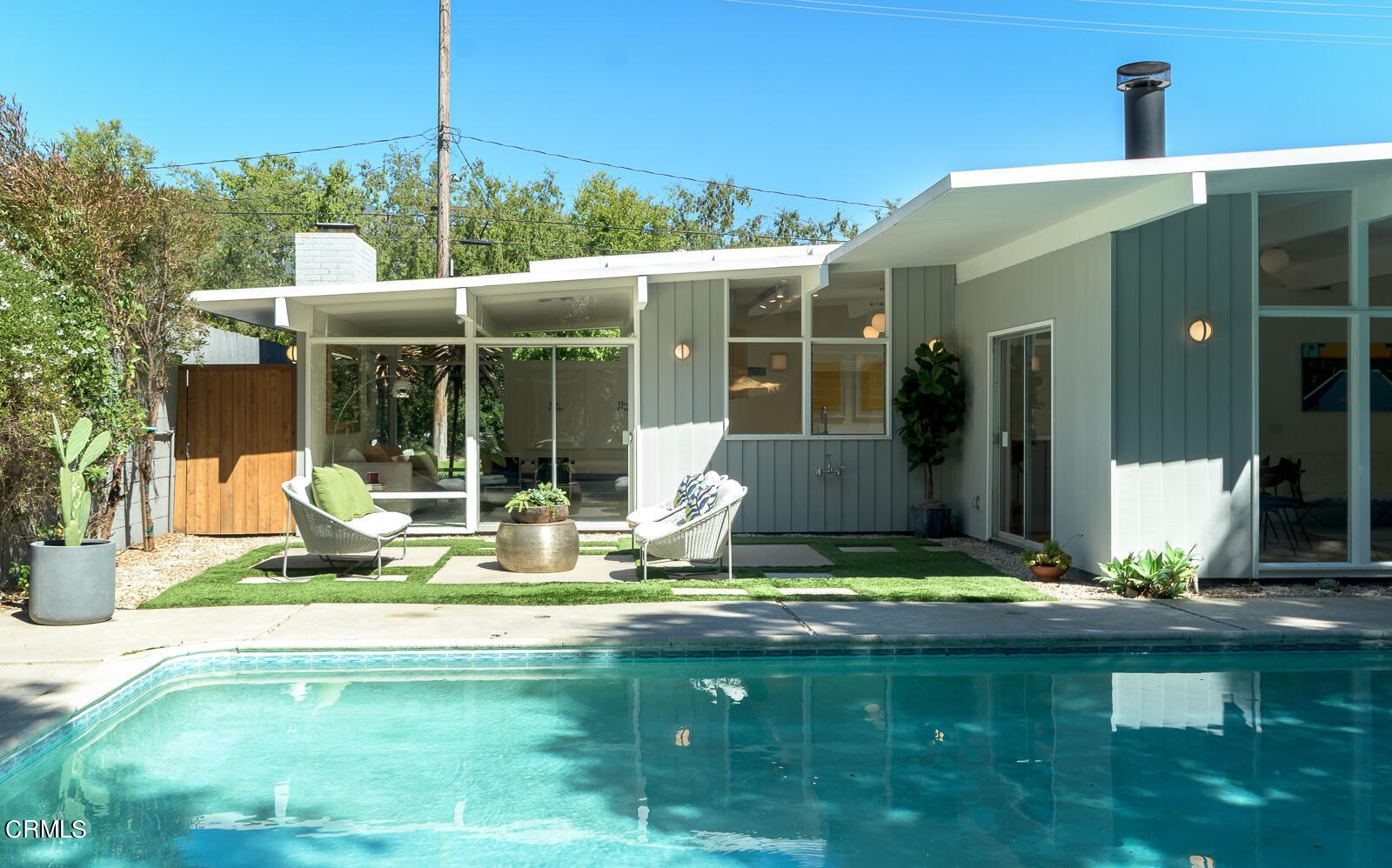 3525 El Lado Drive Glendale, CA 91208 - Photo 41 of 46 a view of swimming pool with lawn chairs and plants