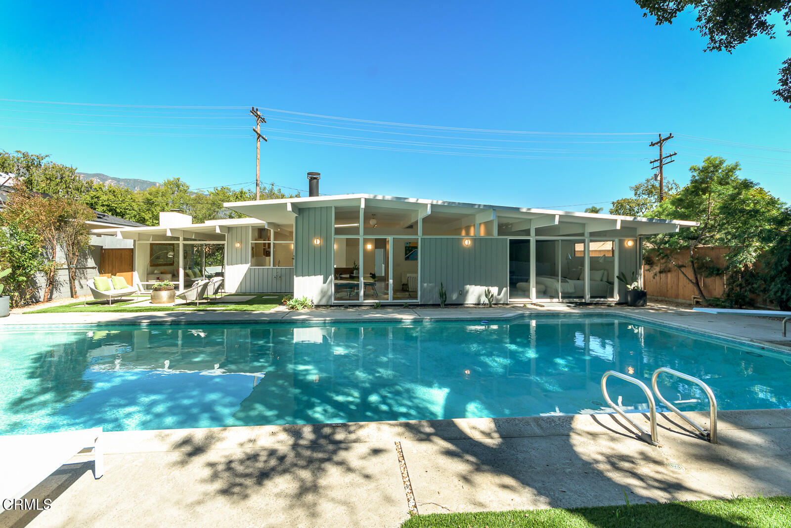 3525 El Lado Drive Glendale, CA 91208 - Photo 43 of 46 a view of a house with backyard swimming pool and sitting area