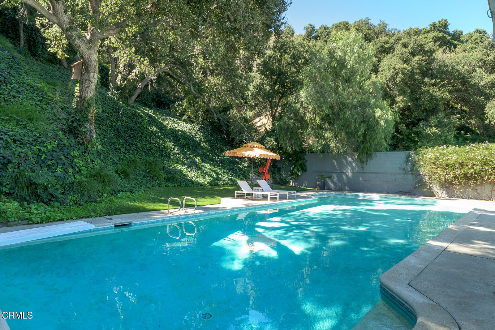 3525 El Lado Drive Glendale, CA 91208 - Photo 45 of 46 a view of a backyard with a table and chairs