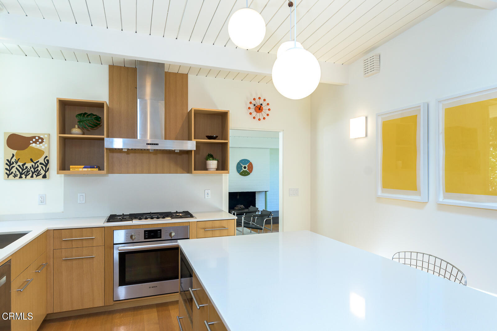 3525 El Lado Drive Glendale, CA 91208 - Photo 10 of 46 a kitchen with stainless steel appliances a stove a sink and a microwave