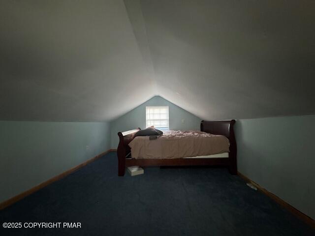 262 Overland Drive Long Pond, PA 18334 - Photo 20 of 27 a bedroom with a bed lamp and a table