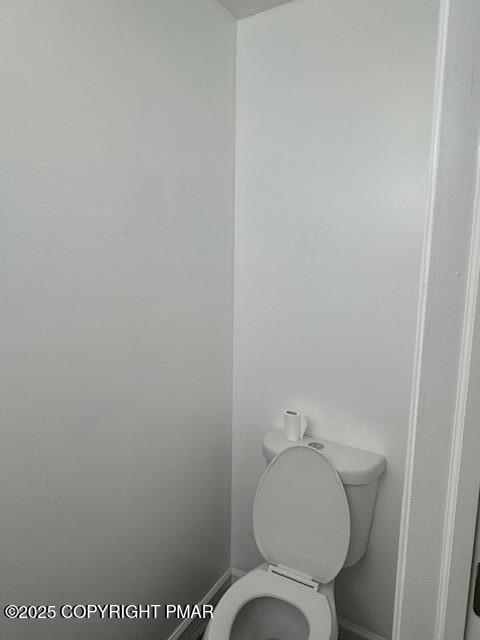 262 Overland Drive Long Pond, PA 18334 - Photo 8 of 27 a white toilet sitting next to a white wall