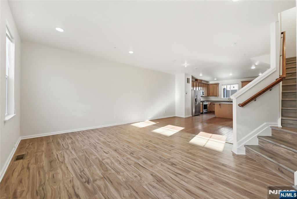 6 Bond Street North Brunswick, NJ 08902 - Photo 20 of 34 a view of empty room with wooden floor