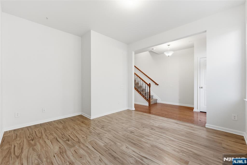 6 Bond Street North Brunswick, NJ 08902 - Photo 5 of 34 a view of empty room with wooden floor