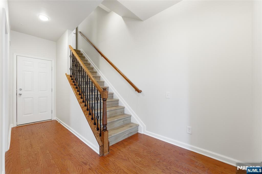 6 Bond Street North Brunswick, NJ 08902 - Photo 6 of 34 a view of entryway with wooden floor