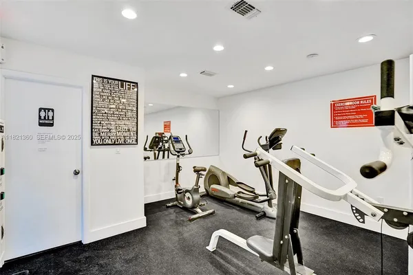 a view of a room with gym equipment