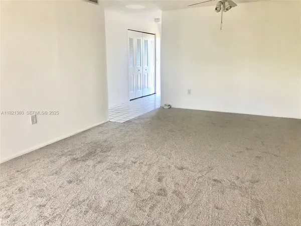 en empty room with windows