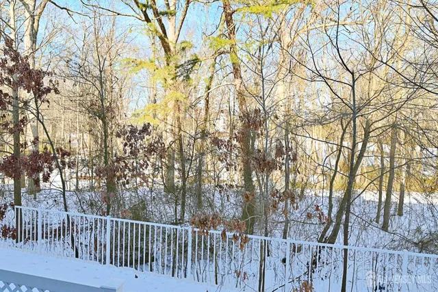 a view of a wooden fence