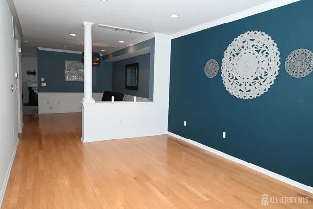 a view of a kitchen with a dishwasher kitchen view and wooden floor