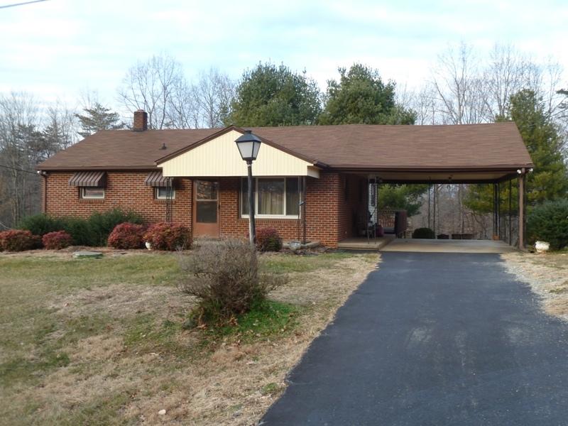 2275 Iron Ridge Road Rocky Mount, VA 24151 - Photo 1 of 16 a view of a house with backyard and garden