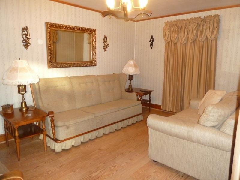 2275 Iron Ridge Road Rocky Mount, VA 24151 - Photo 2 of 16 a living room with furniture and a table