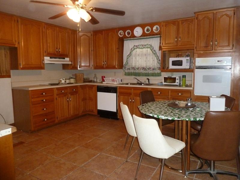 2275 Iron Ridge Road Rocky Mount, VA 24151 - Photo 4 of 16 a kitchen with granite countertop a sink and cabinets