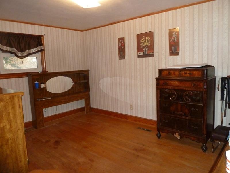 2275 Iron Ridge Road Rocky Mount, VA 24151 - Photo 7 of 16 a view of an empty room with cabinet door