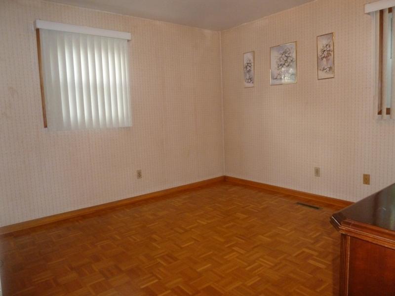 2275 Iron Ridge Road Rocky Mount, VA 24151 - Photo 9 of 16 an empty room with windows
