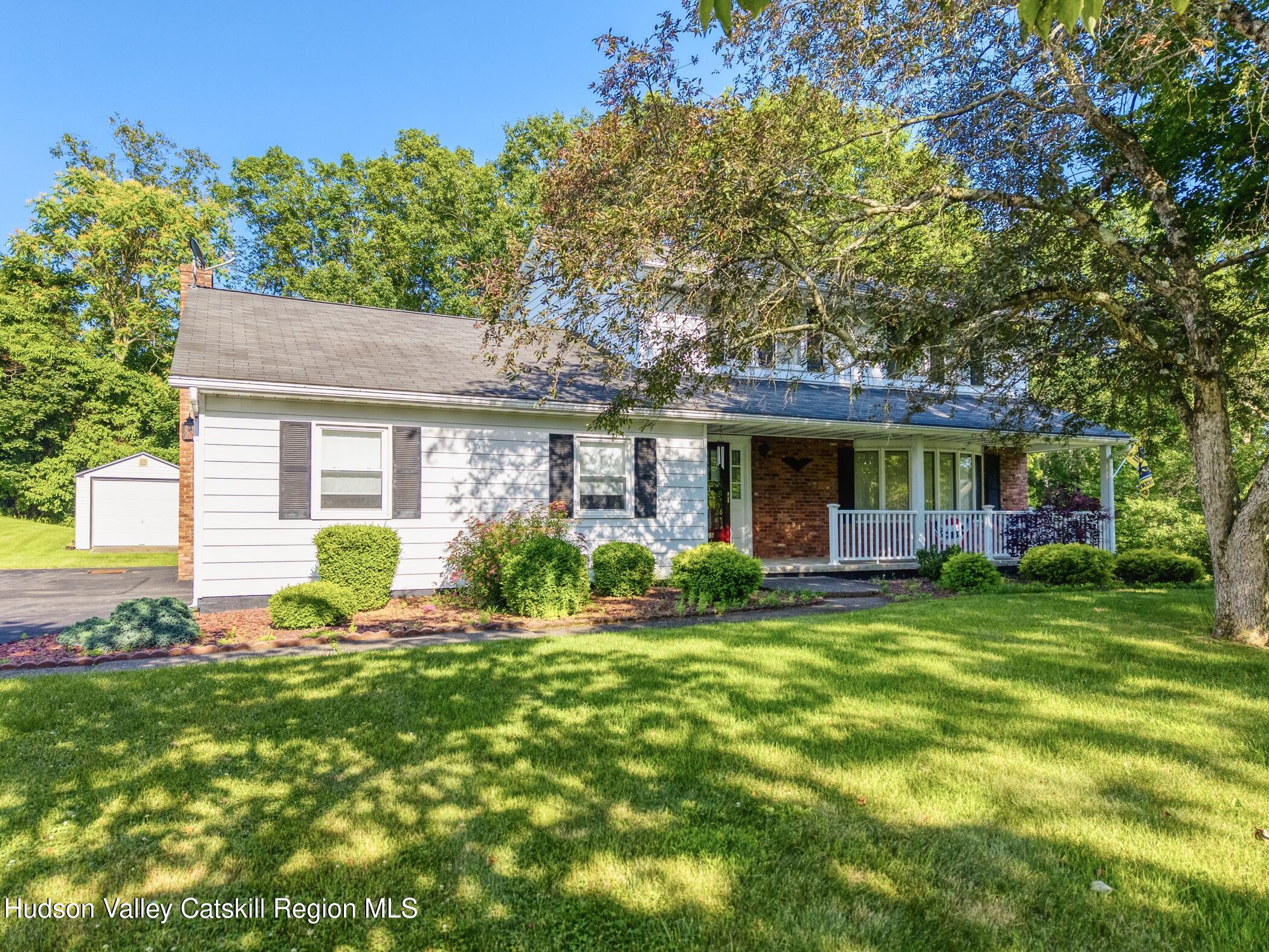 135 Hilltop Road Saugerties, NY 12477 - Photo 1 of 49 a front view of house with yard and green space