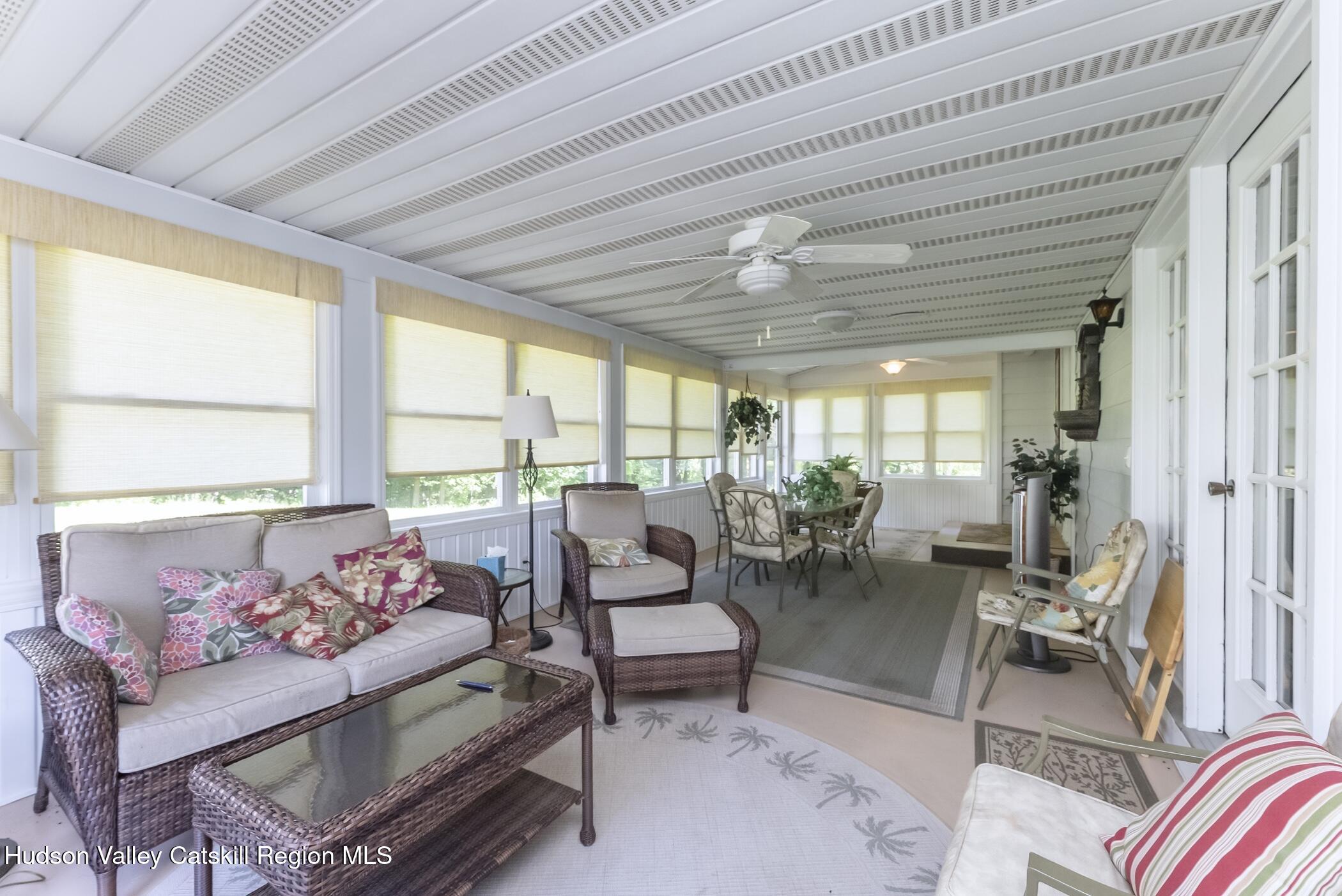 135 Hilltop Road Saugerties, NY 12477 - Photo 17 of 49 a living room with furniture and a large window