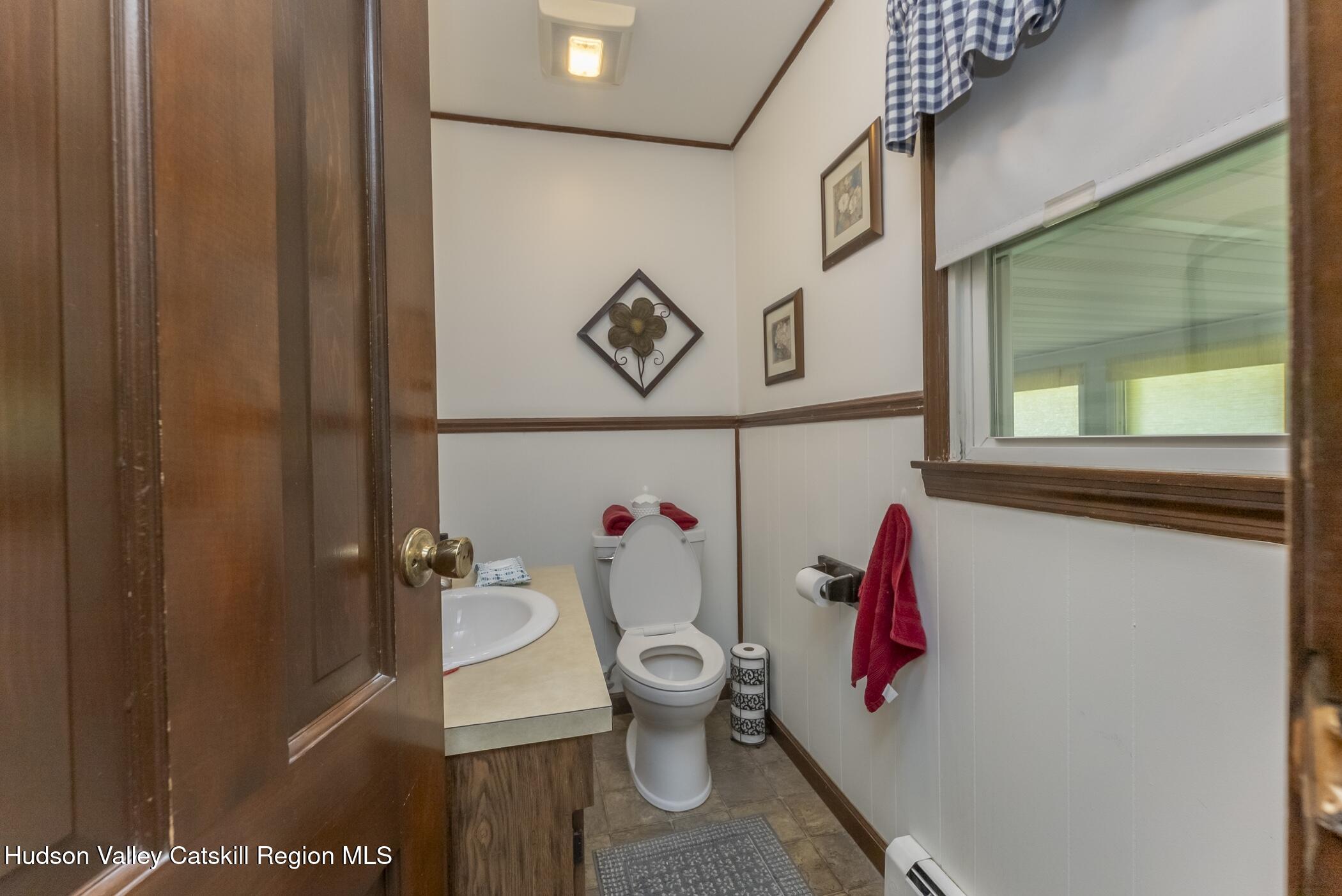 135 Hilltop Road Saugerties, NY 12477 - Photo 24 of 49 a bathroom with a sink toilet and shower