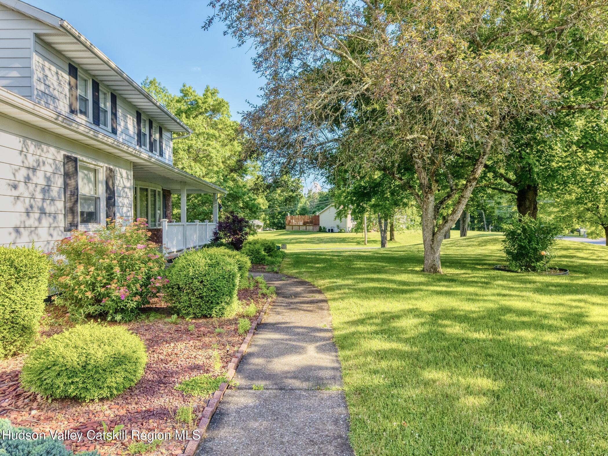 135 Hilltop Road Saugerties, NY 12477 - Photo 3 of 49 a view of a building with a yard