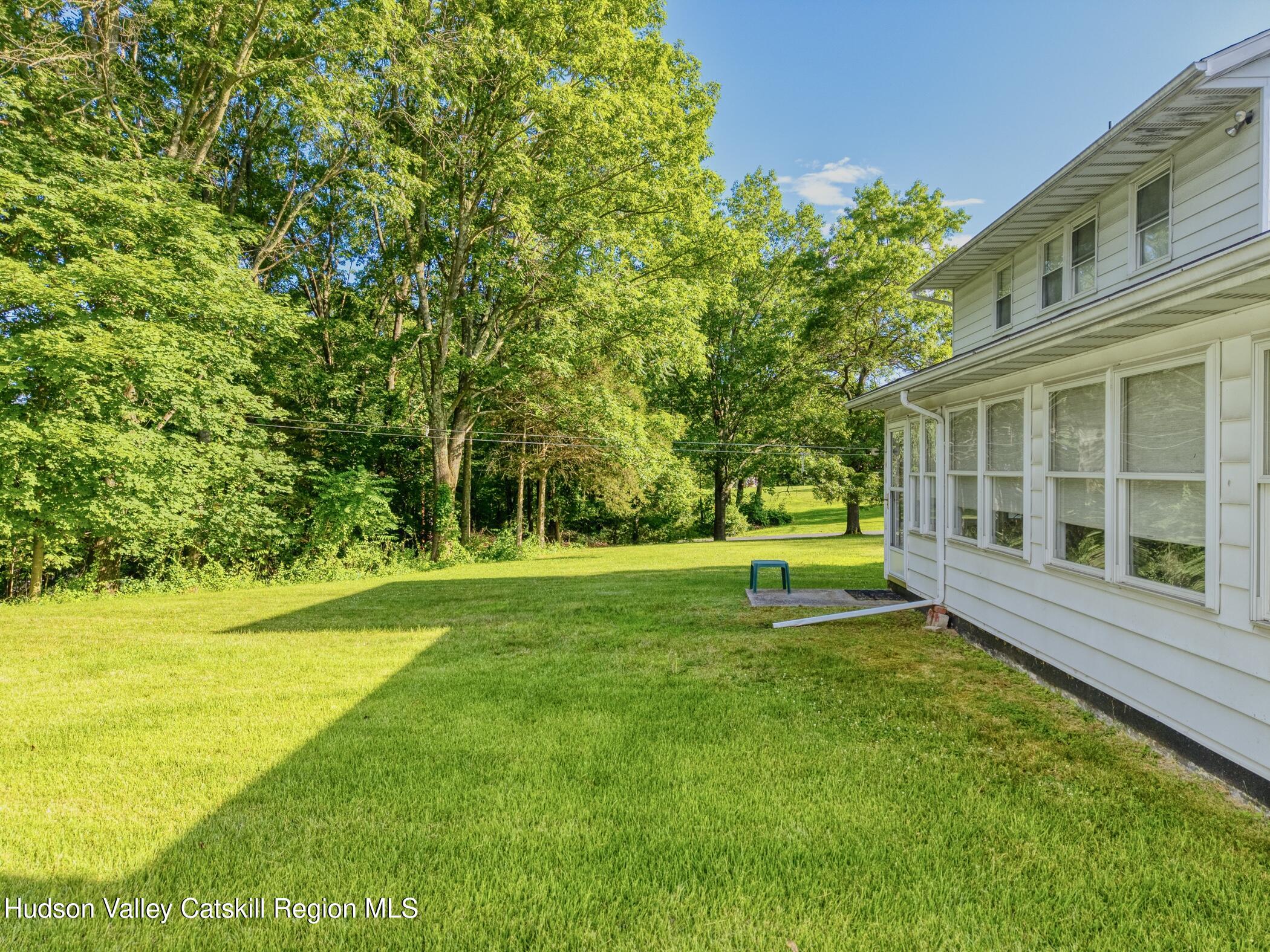 135 Hilltop Road Saugerties, NY 12477 - Photo 42 of 49 a view of a park with a house in the background