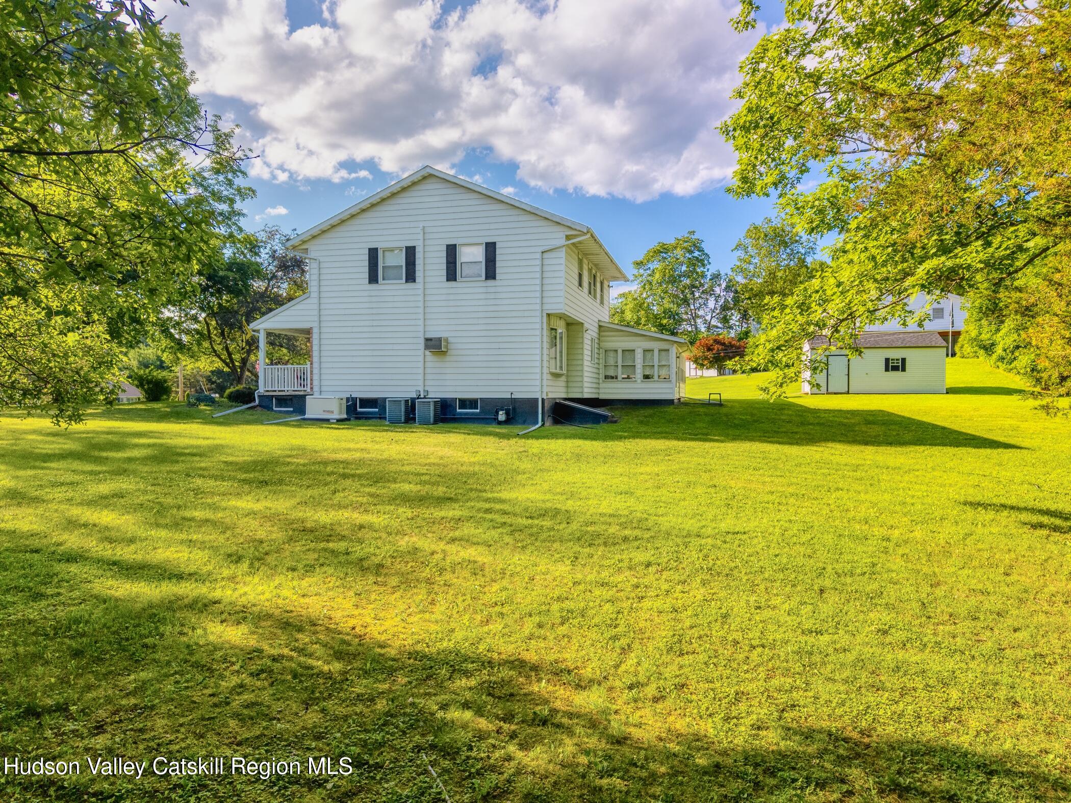 135 Hilltop Road Saugerties, NY 12477 - Photo 43 of 49 a view of a house with a big yard