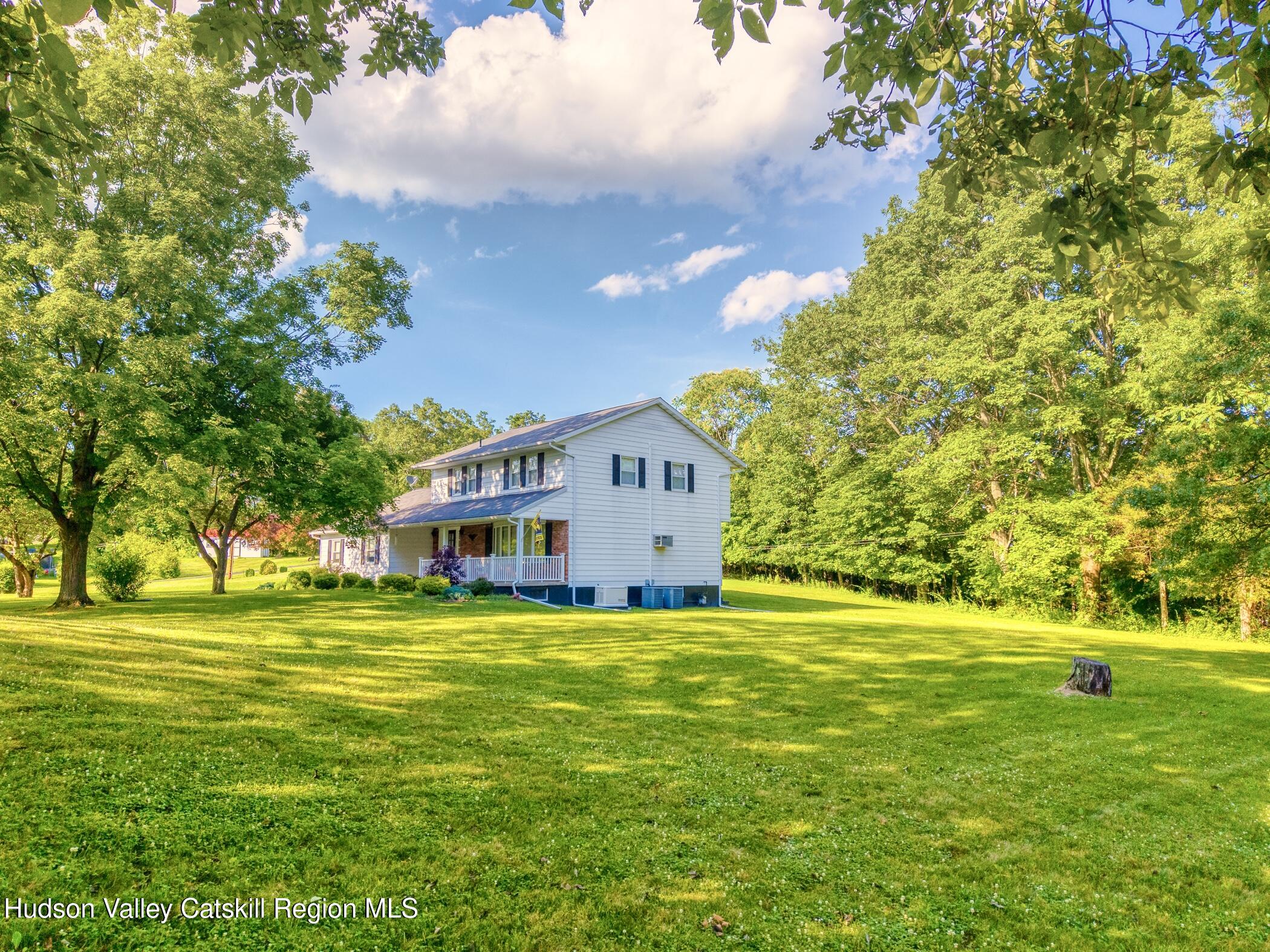 135 Hilltop Road Saugerties, NY 12477 - Photo 45 of 49 a view of a house with a big yard