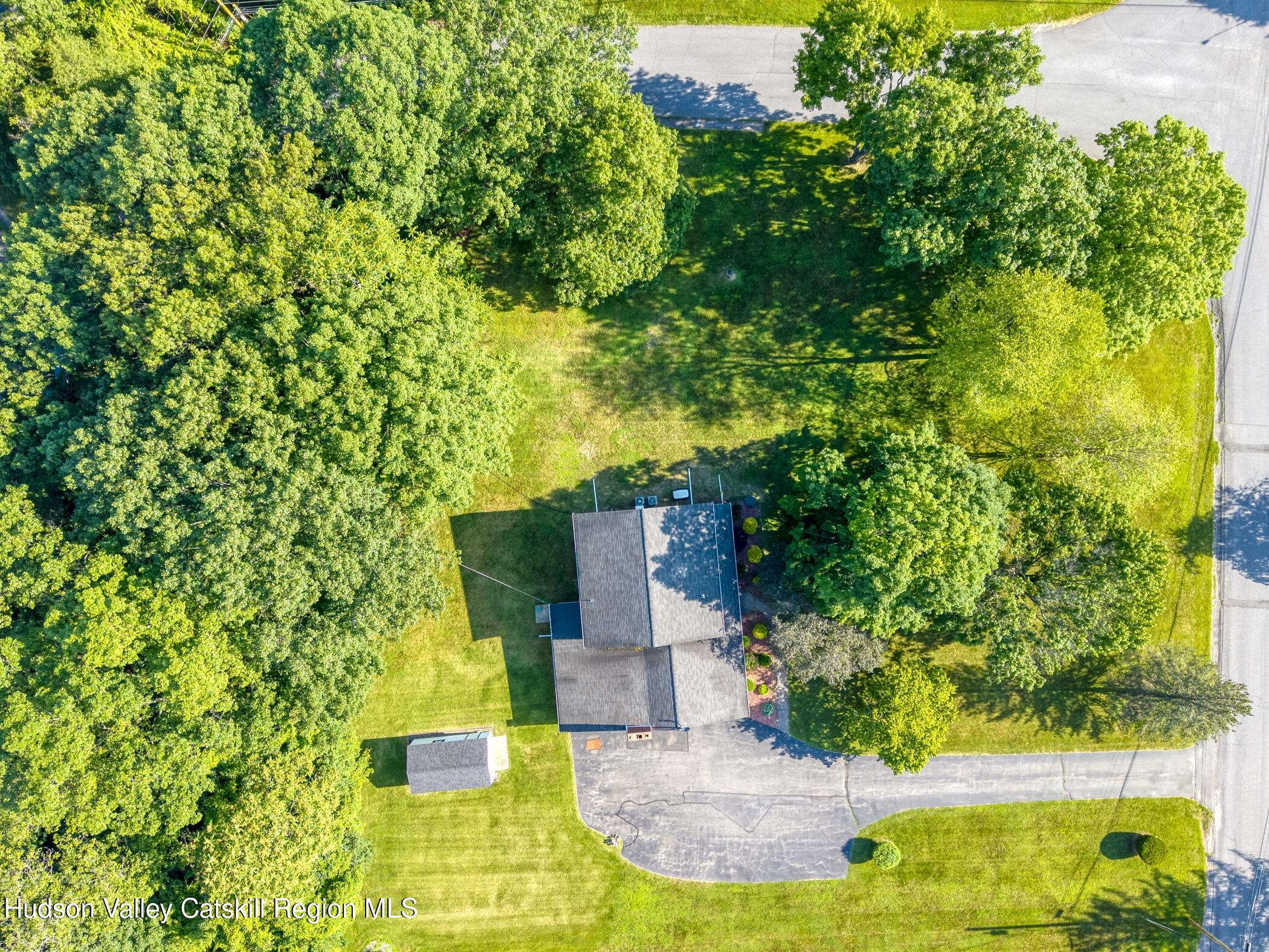 135 Hilltop Road Saugerties, NY 12477 - Photo 48 of 49 an aerial view of a house with swimming pool
