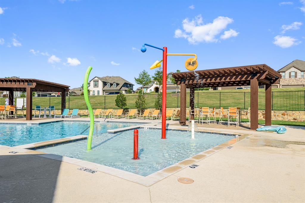 1007 Ashcroft Lane Justin, TX 76247 - Photo 9 of 14 a view of outdoor kitchen and outdoor space