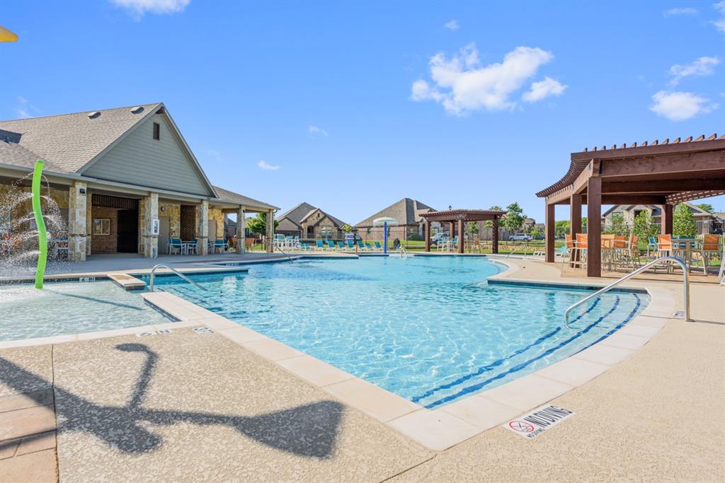 1007 Ashcroft Lane Justin, TX 76247 - Photo 10 of 14 a view of a house with outdoor space