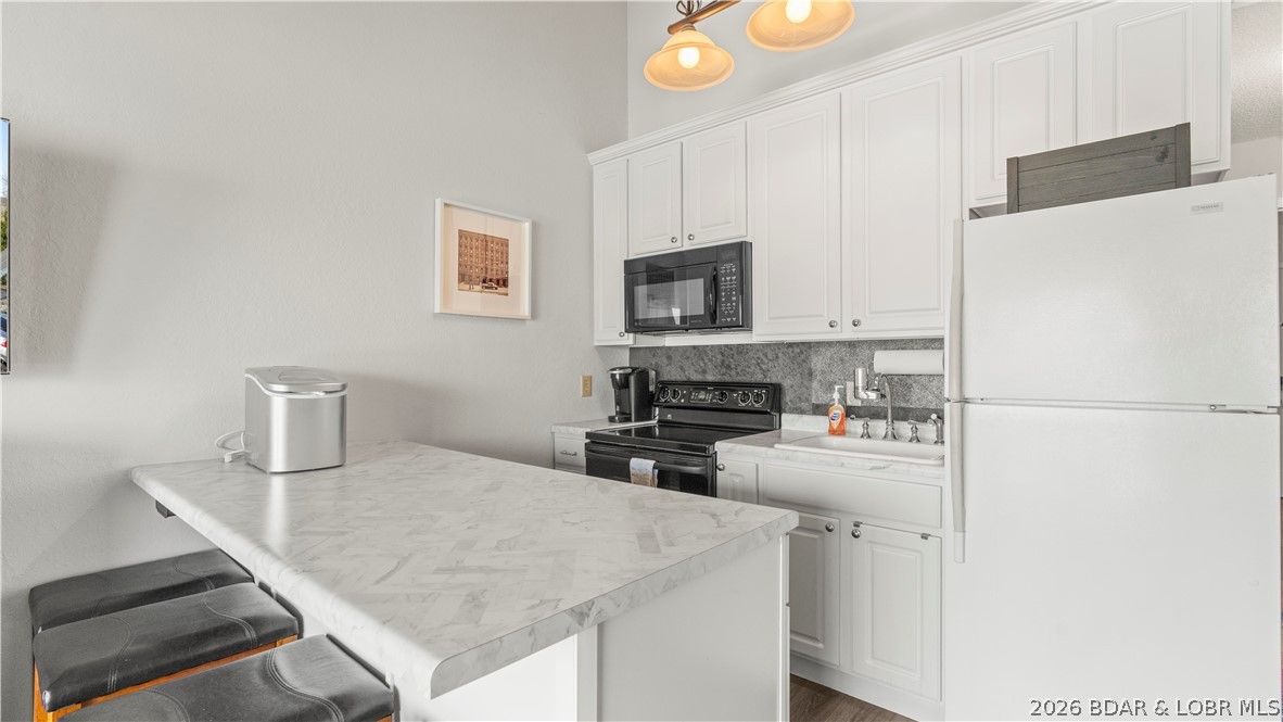 5655 Nichols Road, Unit B406 Osage Beach, MO 65065 - Photo 6 of 36