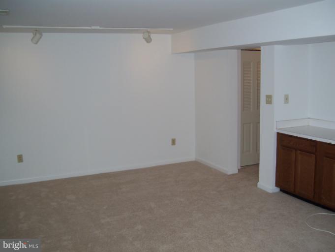 14432 Bakersfield Court Silver Spring, MD 20906 - Photo 7 of 11 a view of an empty room