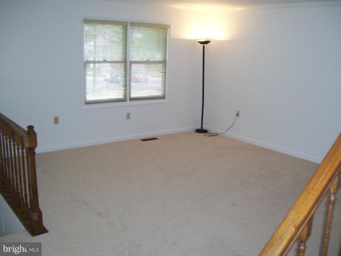 14432 Bakersfield Court Silver Spring, MD 20906 - Photo 8 of 11 a view of an empty room with a window