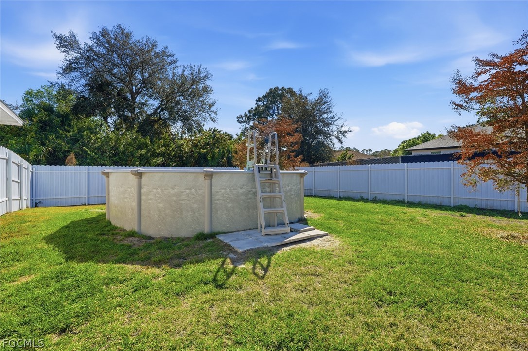 3319 40th Street West Lehigh Acres, FL 33971 - Photo 35 of 45 a garden view