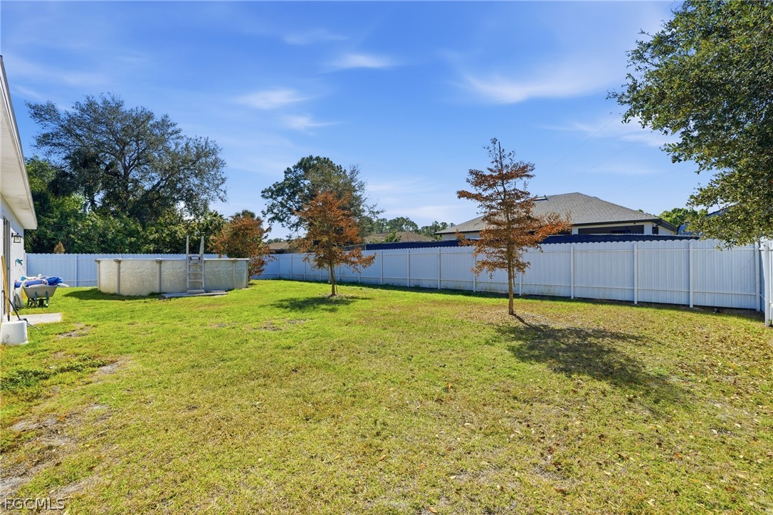 3319 40th Street West Lehigh Acres, FL 33971 - Photo 38 of 45 a view of a backyard