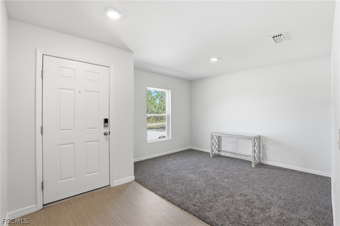 3319 40th Street West Lehigh Acres, FL 33971 - Photo 6 of 45 an empty room with windows and closet