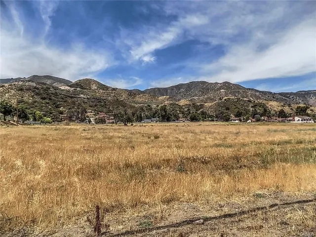 a view of a city street from a balcony