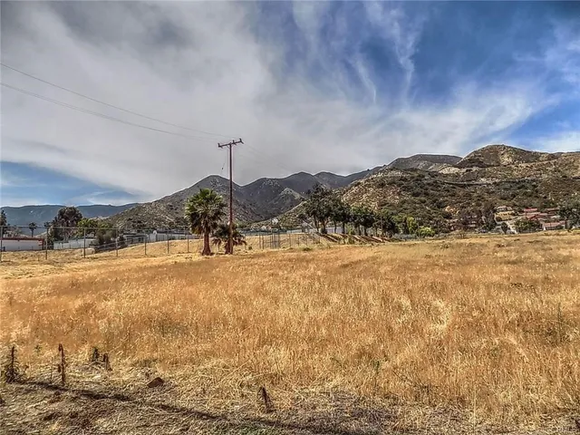 a view of a lake with a mountain in the background